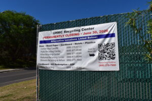 Banner outside of the UHMC Recycling Center with information about closure and alternate locations.